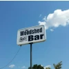 Woodshed Bar logo