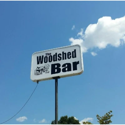 Woodshed Bar logo